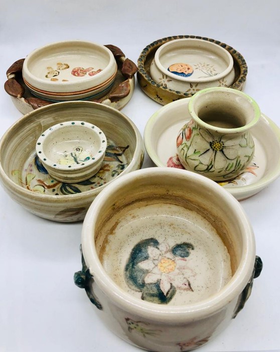 A selection of nine pieces of Studio Pottery signed to the base "Maura"