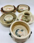A selection of nine pieces of Studio Pottery signed to the base "Maura"