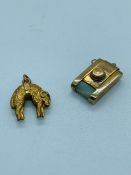 Two 9 ct gold charms, a sheep and a camera. (3.9g)