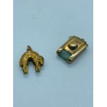 Two 9 ct gold charms, a sheep and a camera. (3.9g)