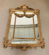 A Large Ornate Gilt frame bevel edged mirror (H 183 cm x L 127cm )