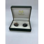 A pair of gents silver cuff links