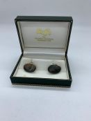 A pair of gents silver cuff links