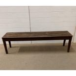 A long garden table/bench