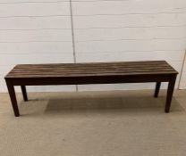 A long garden table/bench