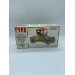 A boxed Pyro vintage brass car 1906 Renault Runabout