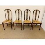 Four mahogany dining chairs