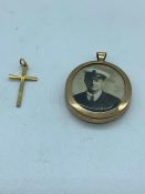 A 9 ct gold cross and a 9 ct gold pendant. (Gold Weight 4.4g)