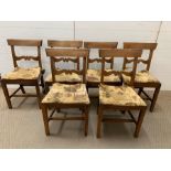 Six oak dining chairs