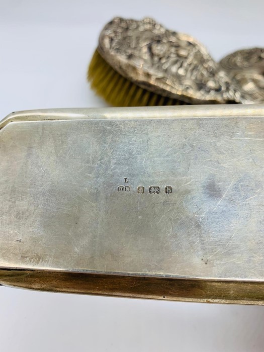 A selection of four silver backed dressing table items. - Image 2 of 3