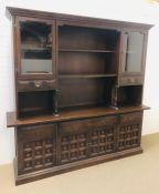 A large dark oak dresser/display cupboard by younger Furniture, The Toledo Range (H200cm D48cm