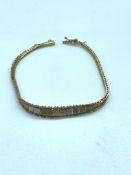 A Three Colour 9 ct gold bracelet (4.9g)