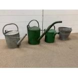 Vintage galvanised watering cans and bucket