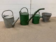 Vintage galvanised watering cans and bucket