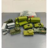 A selection of Army vehicles and trucks to include Dinky