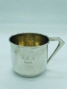 A Hallmarked silver cup, engraved 1935