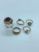 A Selection of Five 9 ct gold rings with a variety of settings including opal, diamonds etc. (11g)