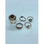 A Selection of Five 9 ct gold rings with a variety of settings including opal, diamonds etc. (11g)