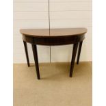 A Demi-Line side table, stain wood banded frieze (H74cm W110cm D74cm)