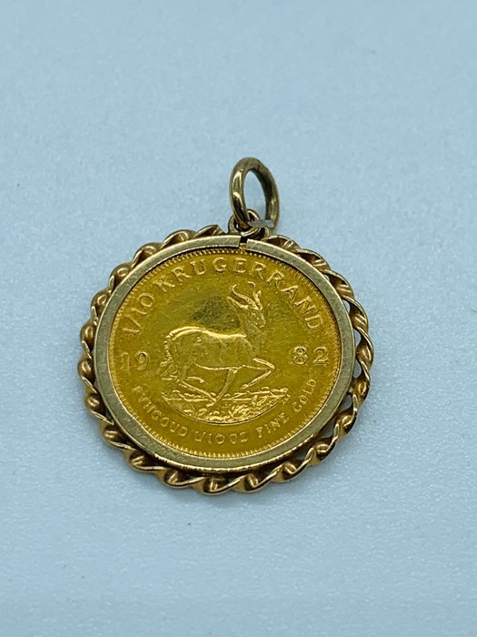 A 1/10th Krugerrand gold coin on a gold mount (4.2g) - Image 2 of 2