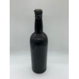 An unmarked bottle of vintage port