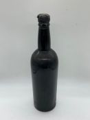 An unmarked bottle of vintage port