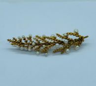 An Untested Gold Floral Brooch