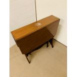 An mahogany Sutherland table (H78cm L69cm folded)