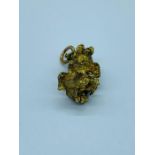 A Gold Nugget (10.3g) with pendant mount.