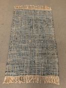 Striped blue rug 90% leather 10% jute (158cm x 93cm)