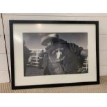 A black and white signed photograph of John Lynn Texas 97 cowboy (61cm x 45cm)