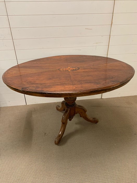 A mahogany breakfast table with inlay tilt top and tripod base H78cm x W 97cm x L 131cm - Image 2 of 4