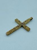 A 9 ct Gold Cross with textured pattern (13g)