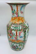 Cantonese famille rose vase, decorated with dignitaries on a terrace enclosed by flowers and