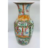 Cantonese famille rose vase, decorated with dignitaries on a terrace enclosed by flowers and