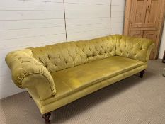 Three seater Chesterfield style sofa on turned legs (230 cm x 98 cm x 68 cm)