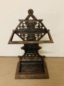 A cast iron stick stand and metal drip tray H69cm x D22cm x L40cm