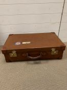 A Vintage Brown Leather Suitcase