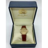 A Bueche-Girod 9ct gold Gents watch on leather strap.