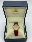 A Bueche-Girod 9ct gold Gents watch on leather strap.