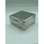 A Silver Cigarette Box by H & Co Ltd Dated London 1929