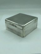 A Silver Cigarette Box by H & Co Ltd Dated London 1929