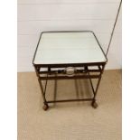 A metal table with leather effect look to frame H 54cm x top 47 sq