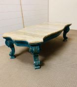 A low marble top coffee table