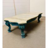 A low marble top coffee table