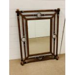 A metal mirror with a leather effect look to frame W 70cm x H 87cm