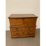 A walnut muse chest (H92cm W97cm D48cm)