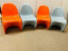 Four Verner Panton children's stacking chairs of single form injections, molded and signed