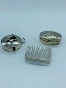 Three silver pill boxes