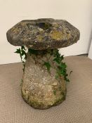 Straddle stone with weathered patina